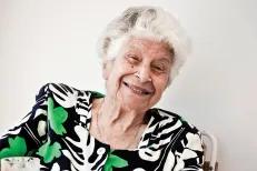 Elderly lady looking into camera
