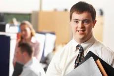 Young man with down syndrome looking at camera