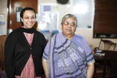 Image of older Asian woman with her daughter
